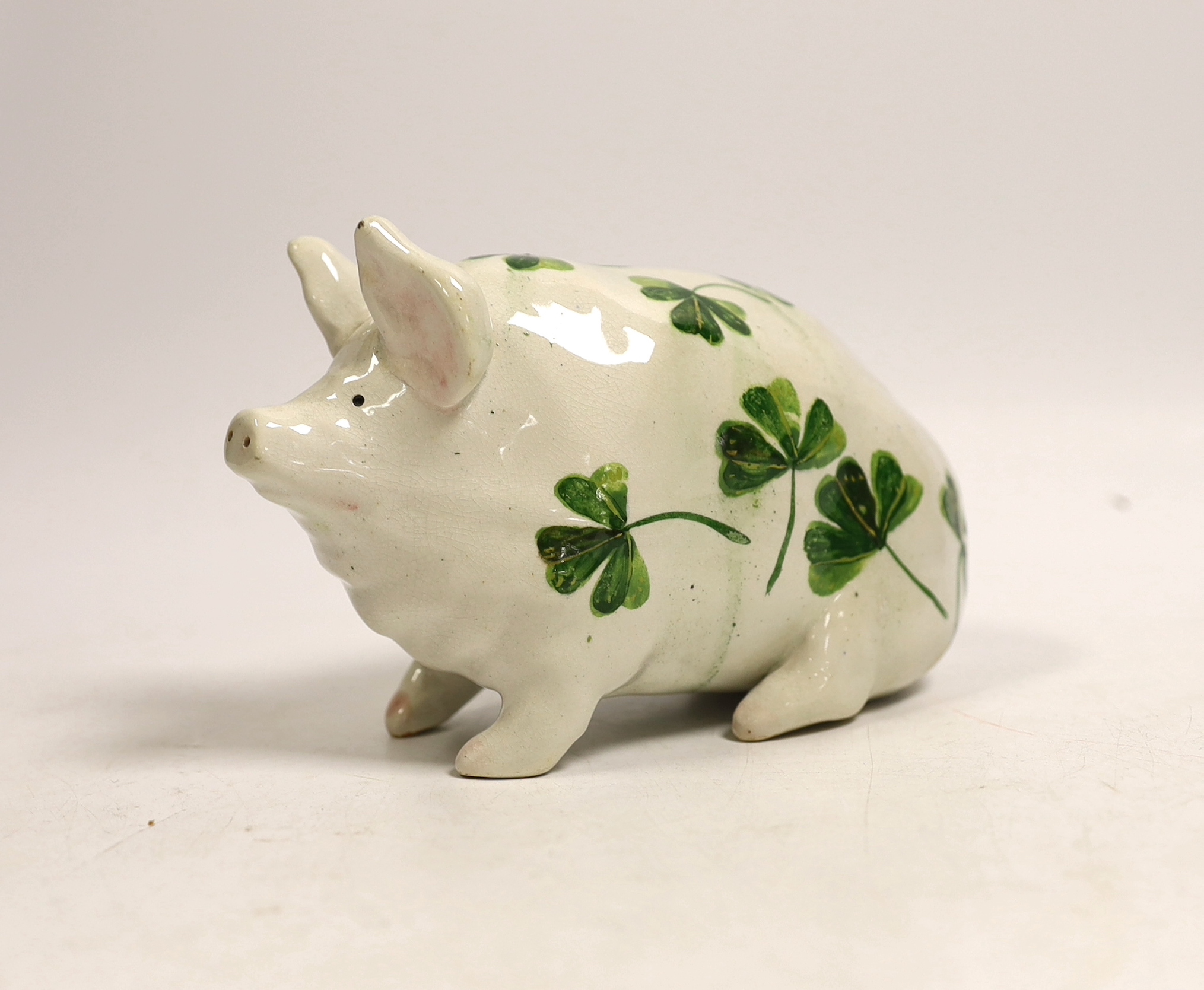 A Wemyss plain green clover pig, 15cm